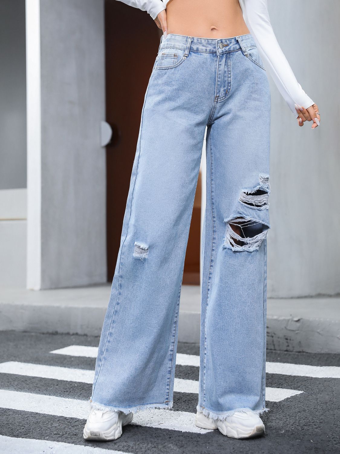 Meja - Distressed Raw Hem Wide Leg Jeans med stilren design