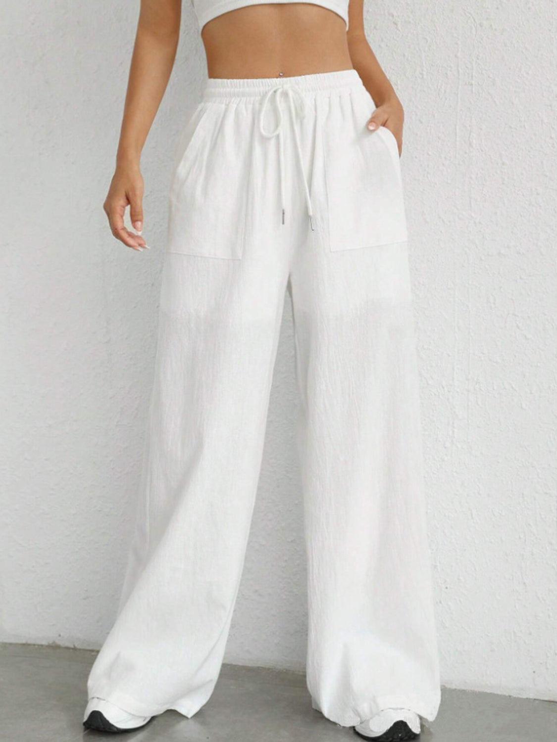 Nomi - Bekväma drawstring wide leg pants med fickor
